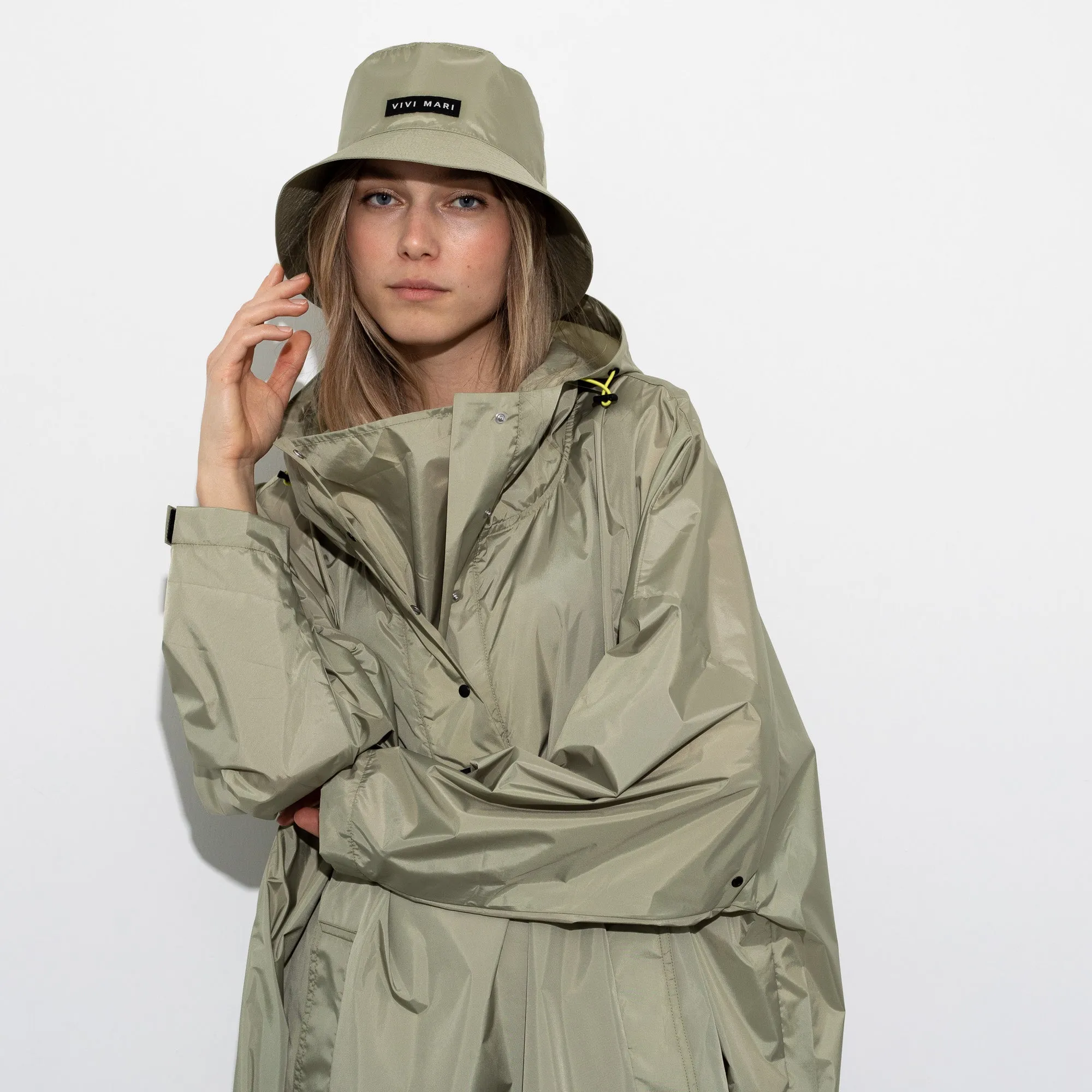Raincoat solid pale olive
