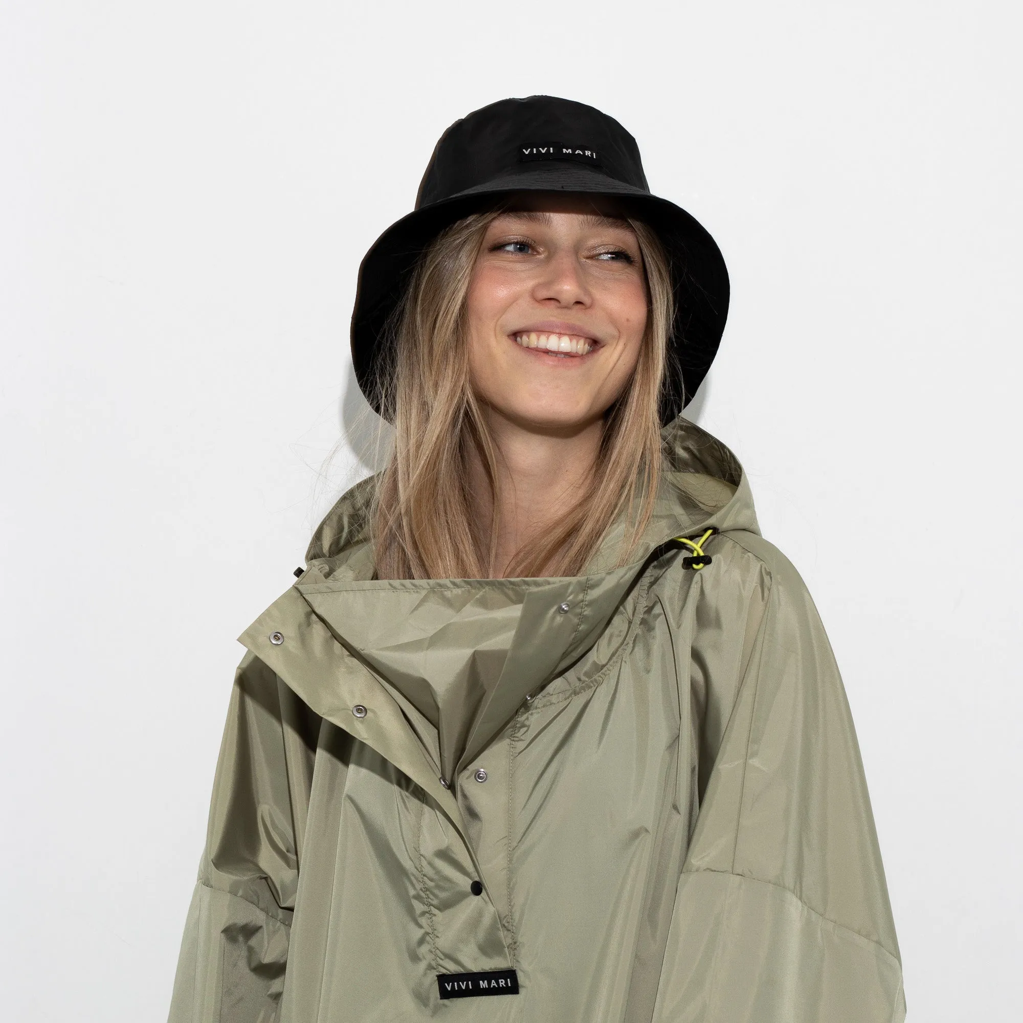 Raincoat solid pale olive