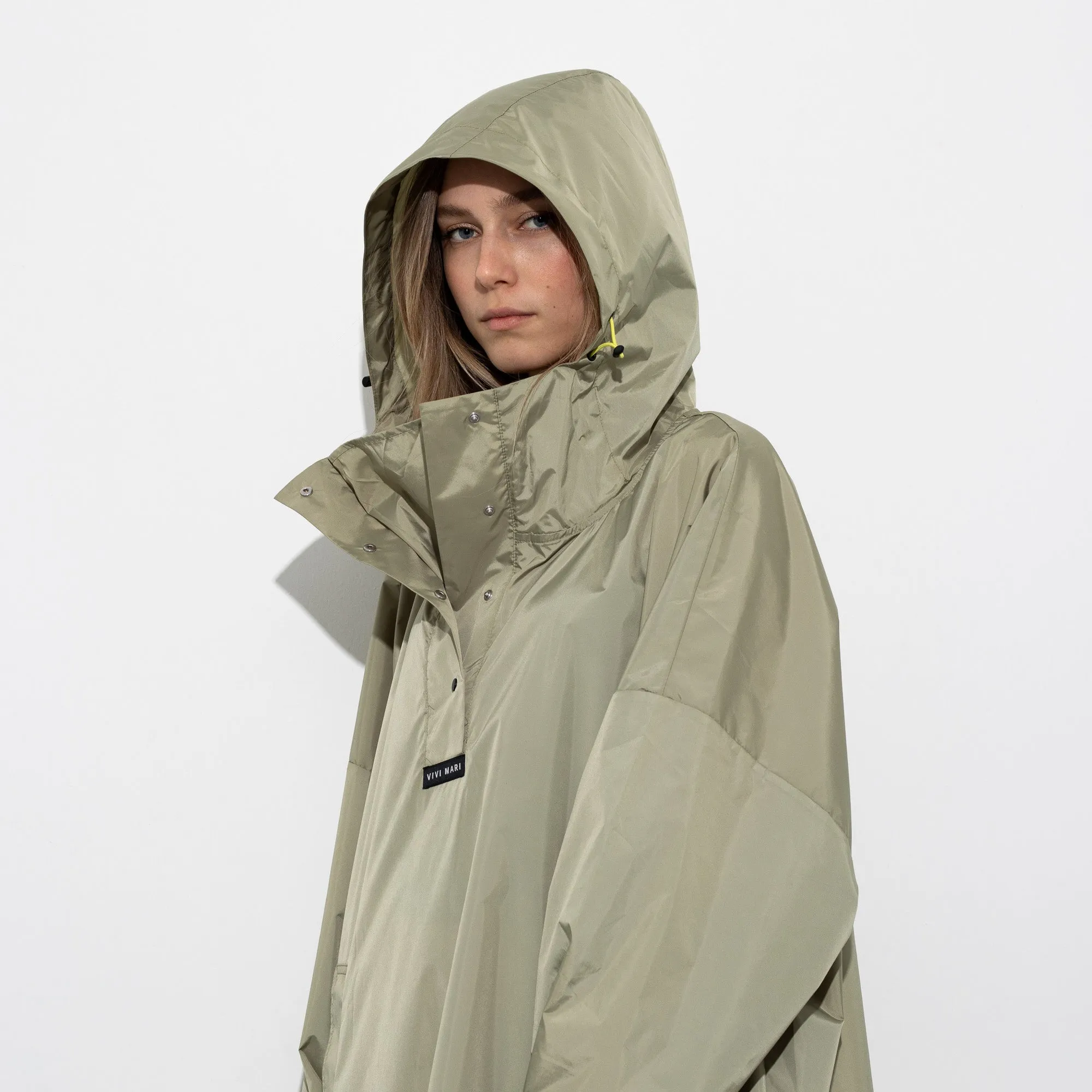 Raincoat solid pale olive