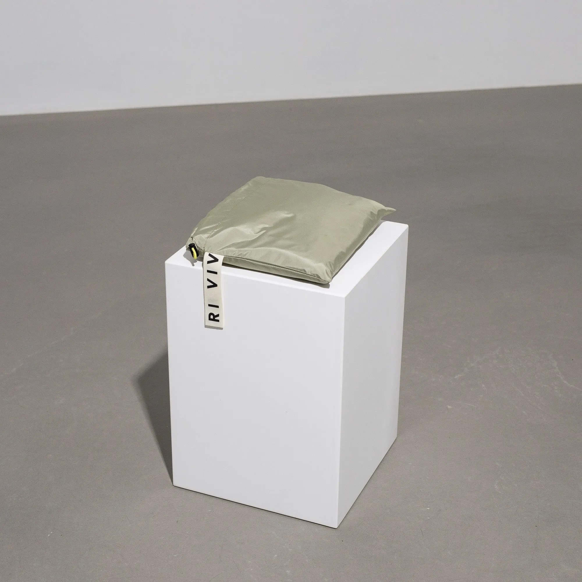 Raincoat solid pale olive