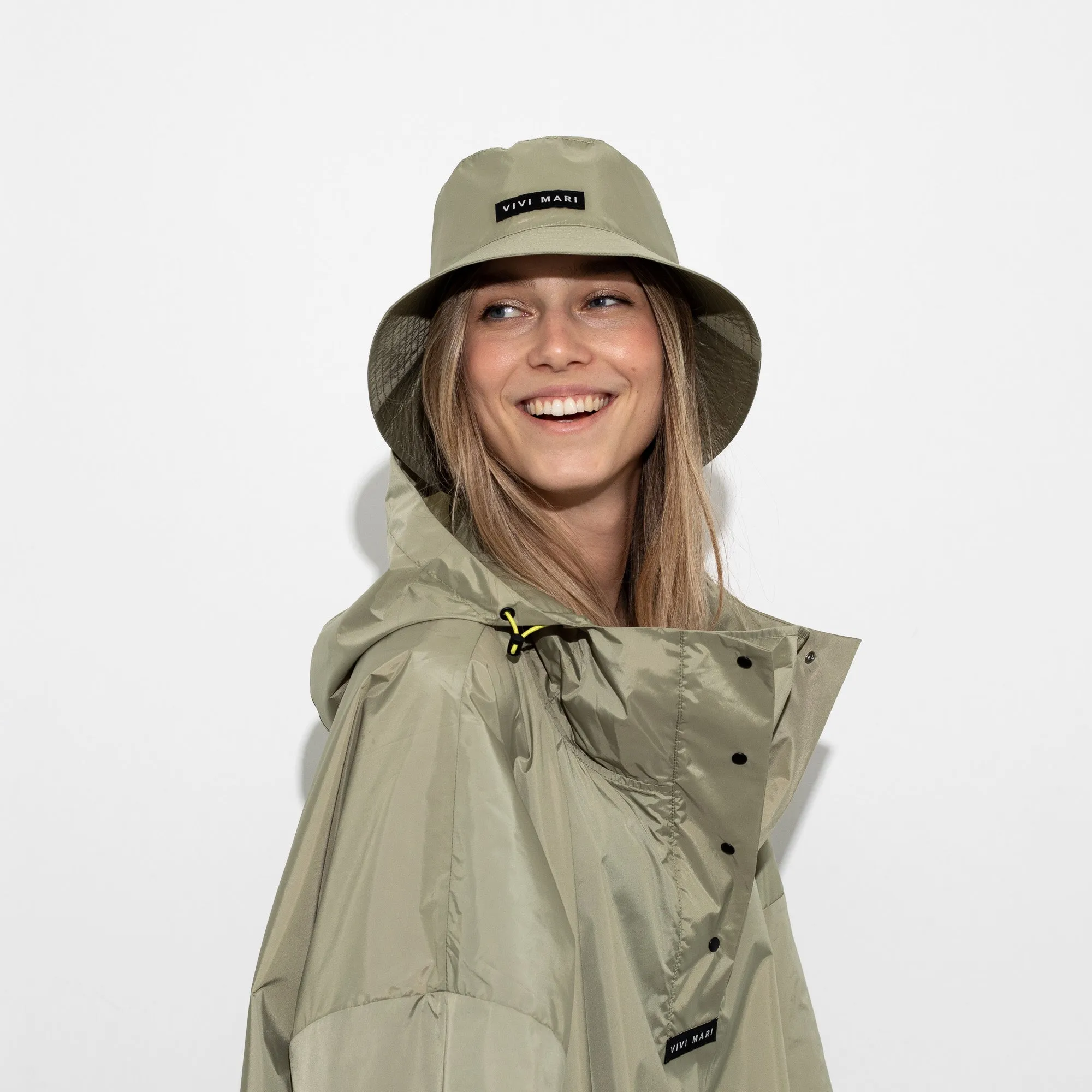 Raincoat solid pale olive