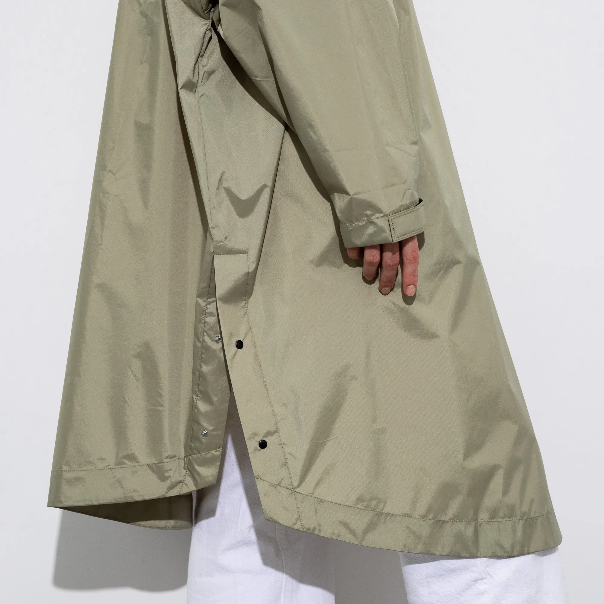 Raincoat solid pale olive