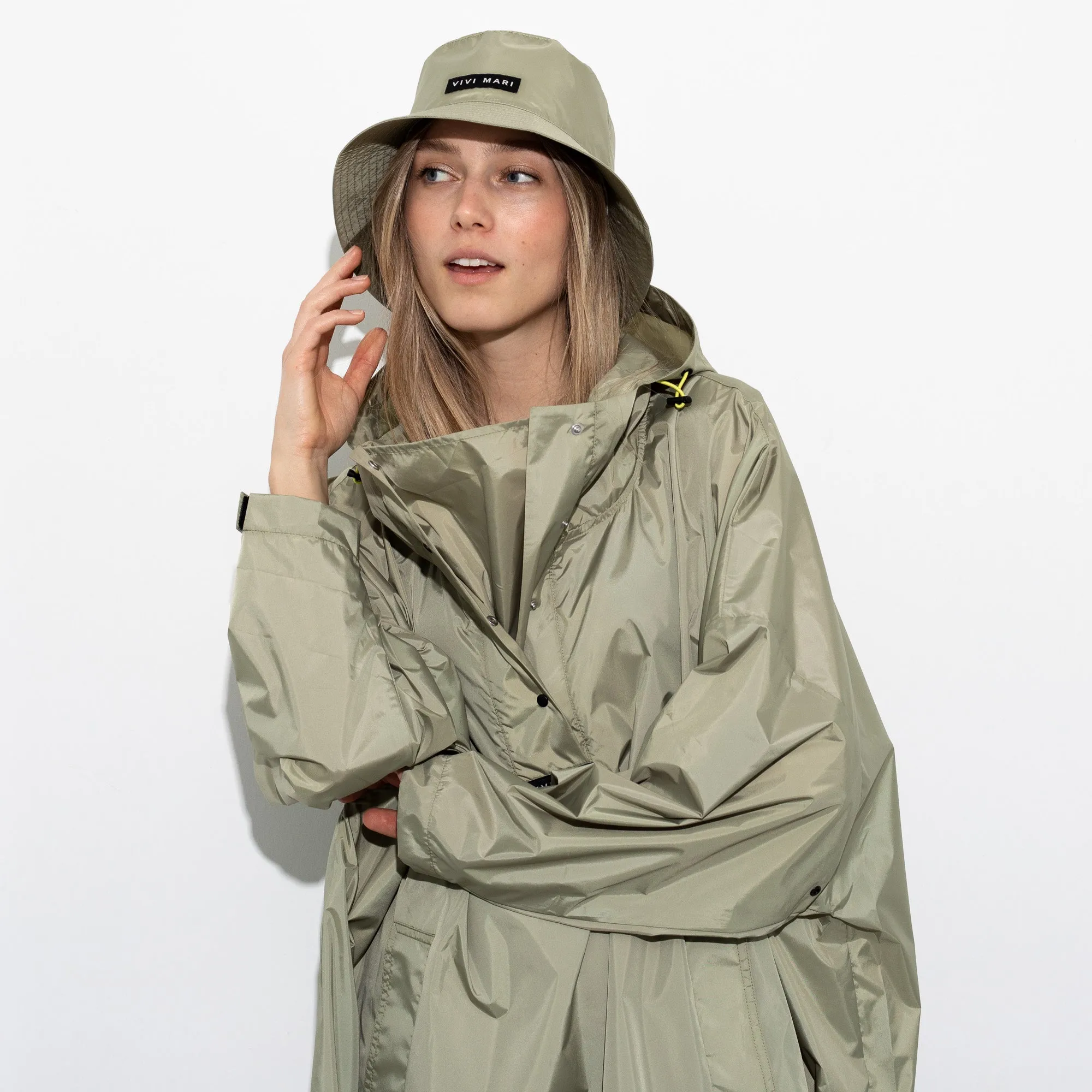 Raincoat solid pale olive