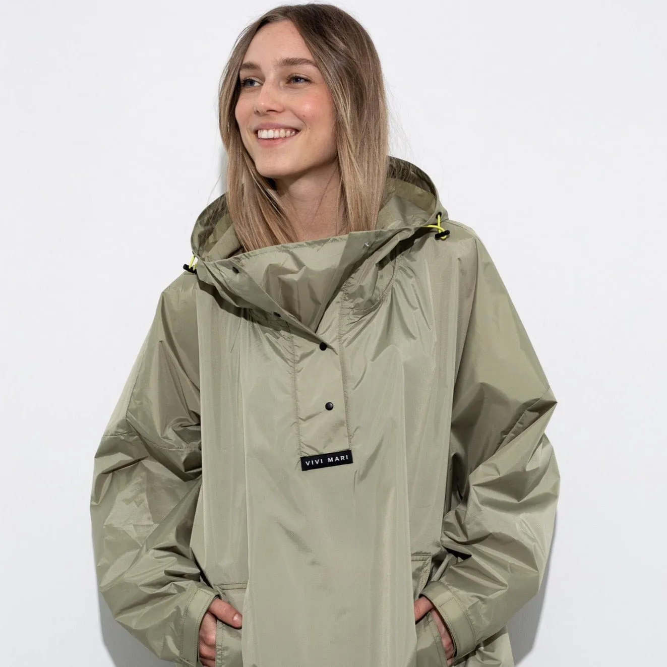 Raincoat solid pale olive