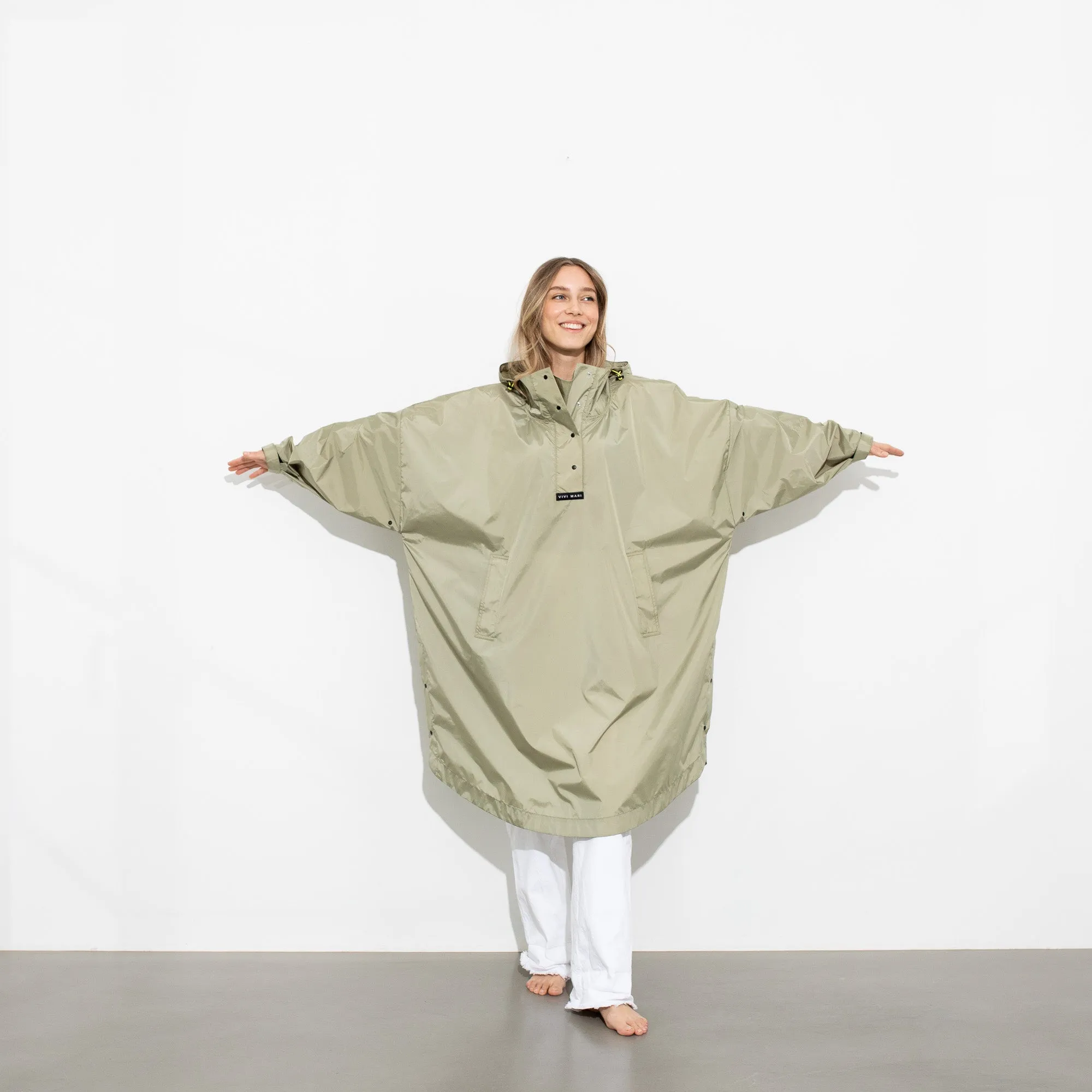 Raincoat solid pale olive